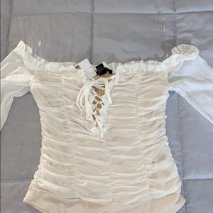 Ruffled lace long sleeve bodysuit